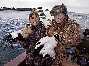 Ray, 11, and Max, 12, with their trophy eiders
